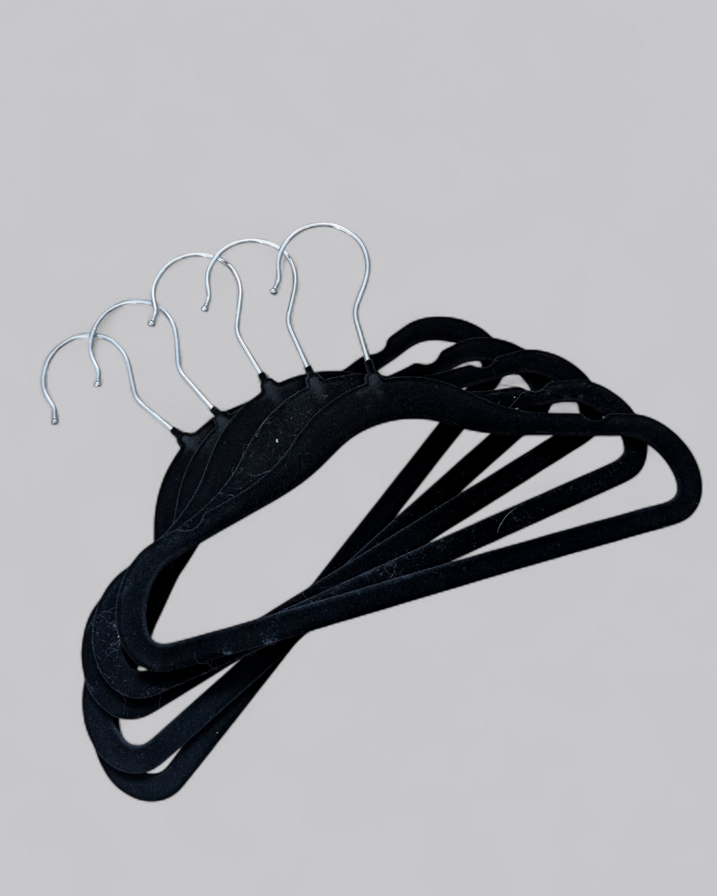 Black velvet hangers for Pawdrobe from Canine Cloakroom collection. 